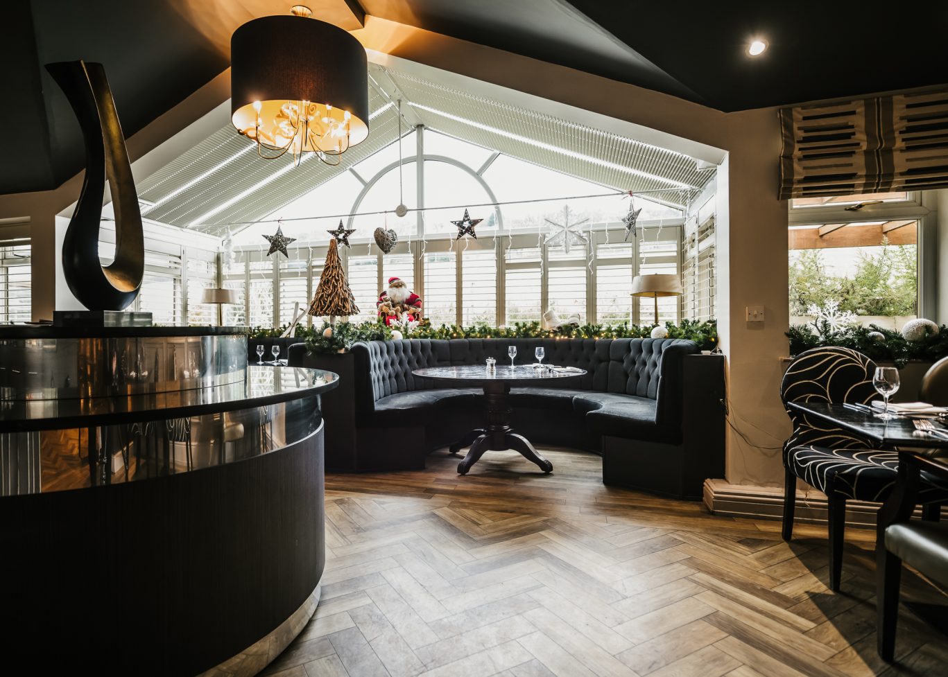 restaurant filled with christmas decorations