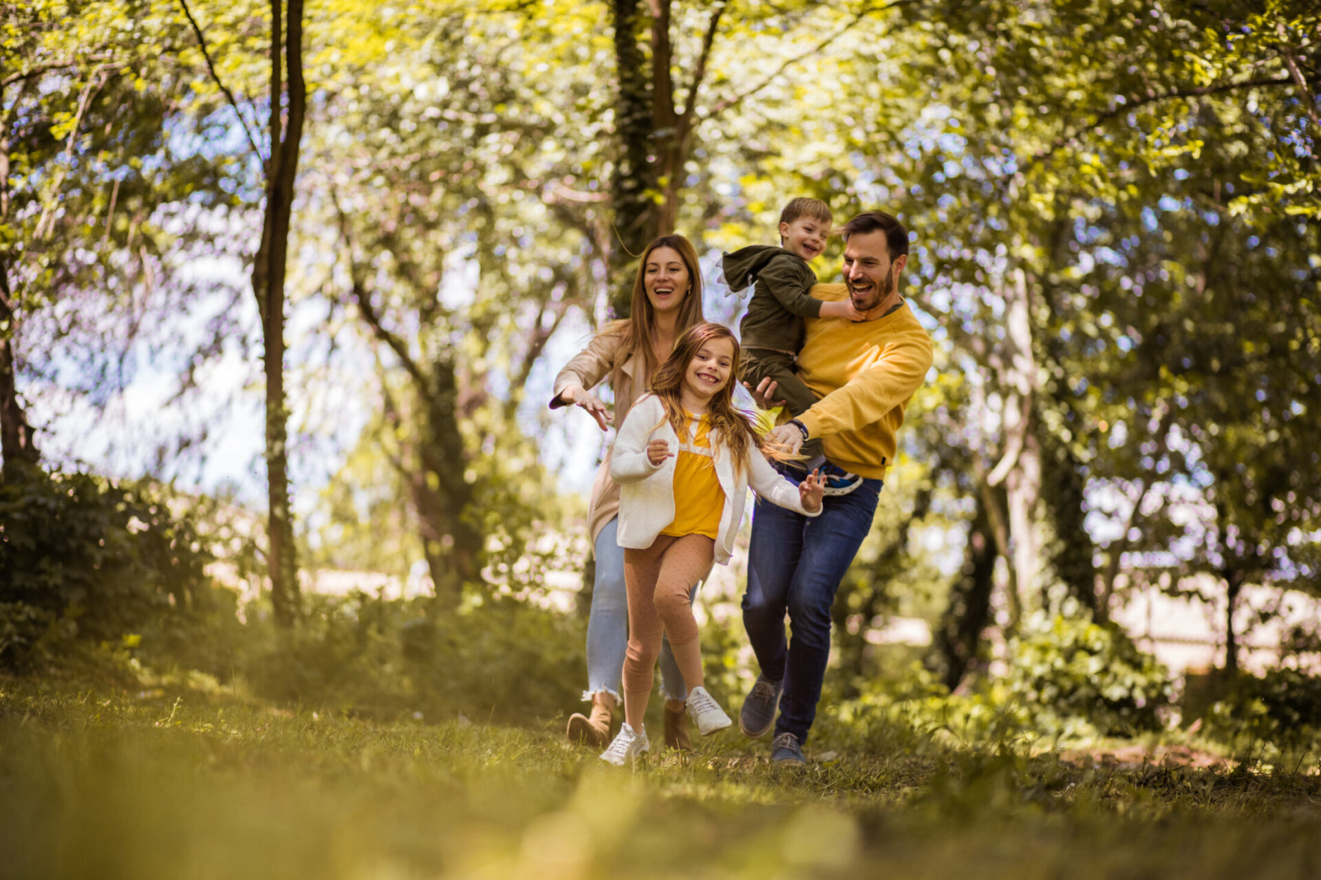 family walking through field