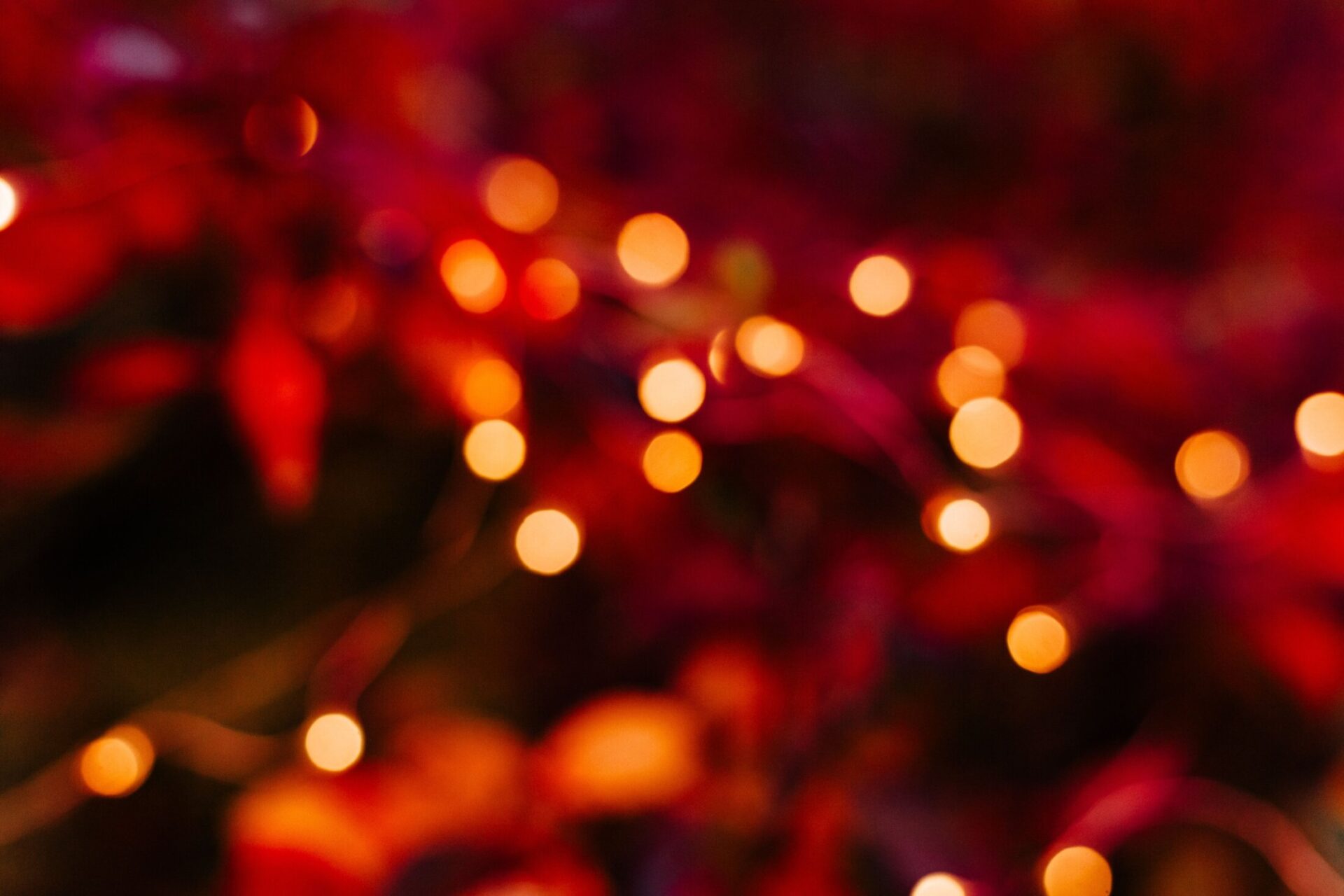 Vibrant and festive lights in warm tones, perfect for holiday and celebration themes.